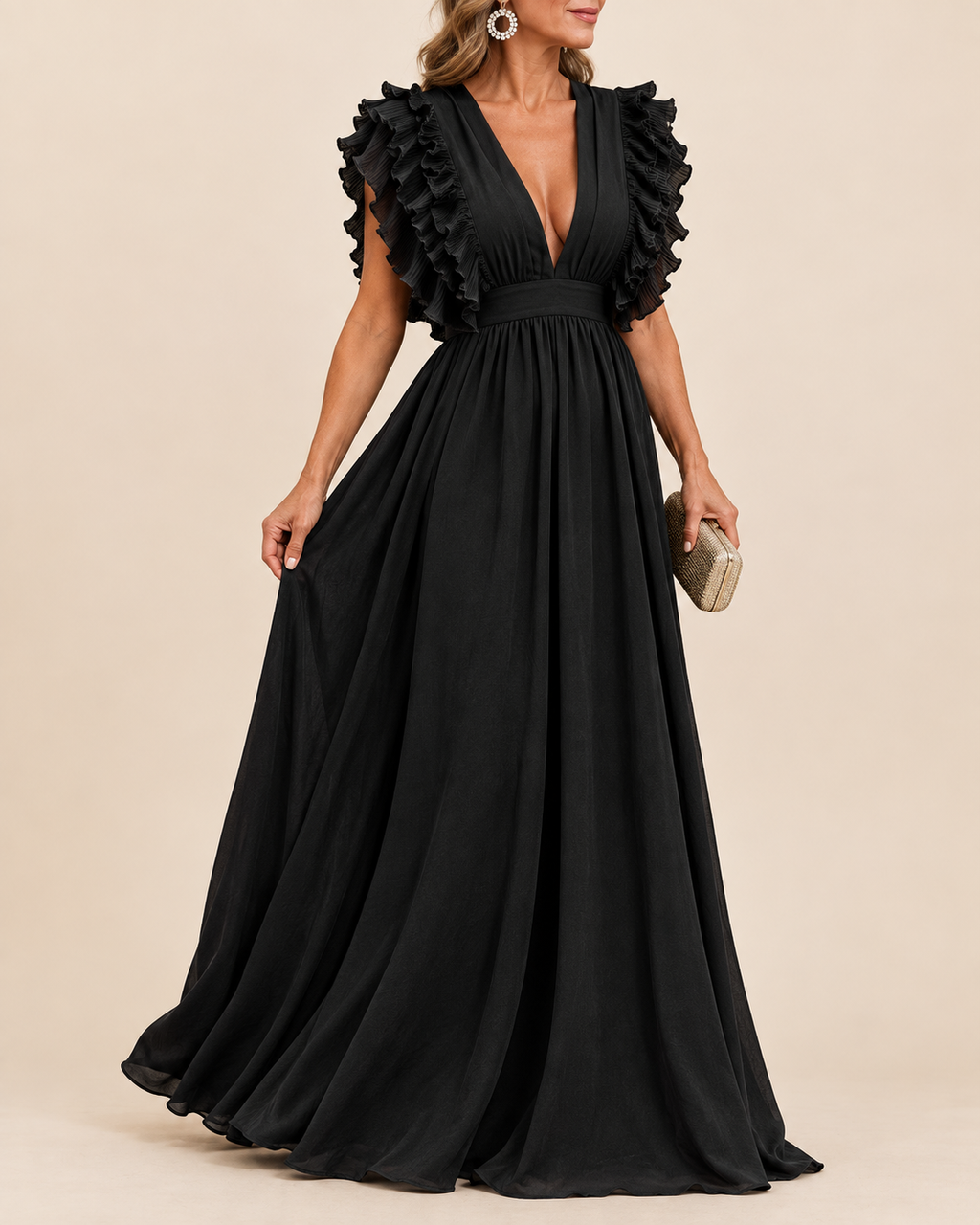 A woman models a floor-length black gown with a plunging V-neckline, ruffled cap sleeves, and a gathered waist, photographed against a plain beige studio background.