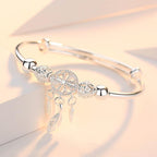 Elowen - Women's Elegant Charm Bracelet with Feather Accents