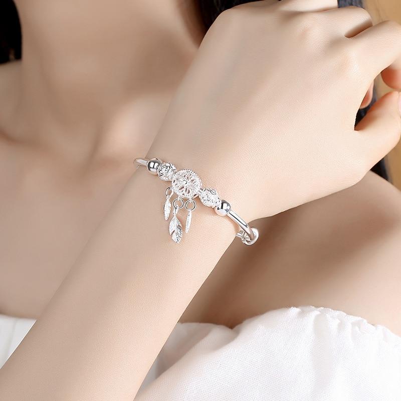 Elowen - Women's Elegant Charm Bracelet with Feather Accents