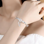 Elowen - Women's Elegant Charm Bracelet with Feather Accents